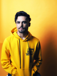 yellow-hoodie-arms-in-pocket